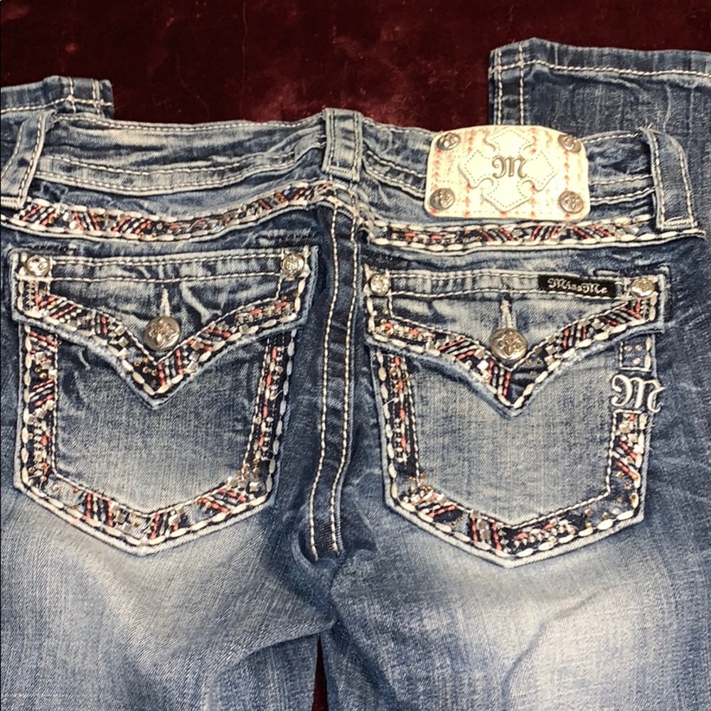 Miss Me size 26 boot cut ripped jeans